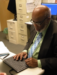 photo of physician working at computer